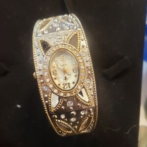 Silver cluch bracelet watch